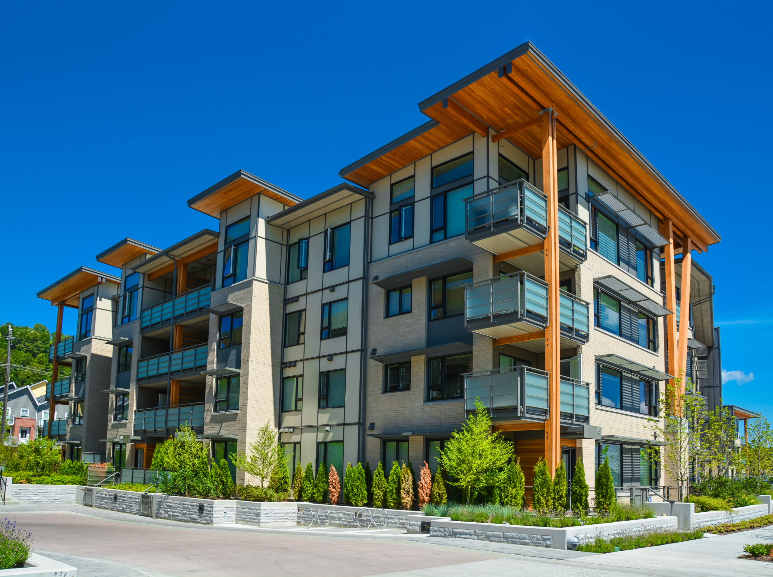Brand new apartment building on sunny day in British Columbia, Canada.